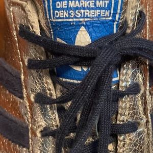 Rare find Adidas silver streak sneakers.